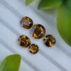 Lot of greenish yellow natural Epidotes, oval and round shapes, 4.63 ct