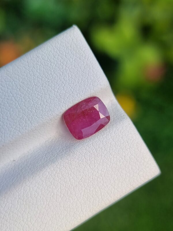 Untreated 1.94 ct cushion-cut Afghan Ruby in a rich purplish red shade, embodying natural elegance.