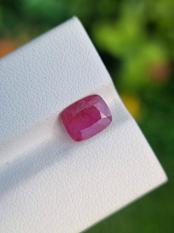 Untreated 1.94 ct cushion-cut Afghan Ruby in a rich purplish red shade, embodying natural elegance.