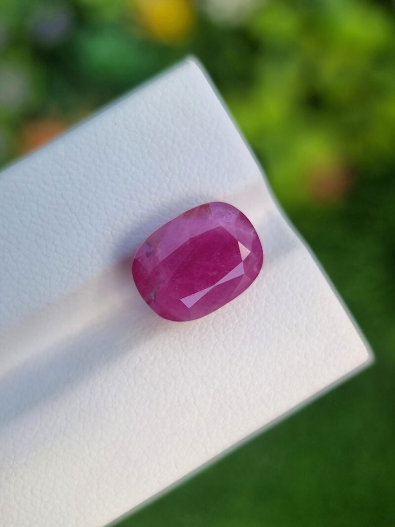 7.49 ct natural Afghan Ruby in a deep purplish red hue, expertly cushion-cut for maximum brilliance.