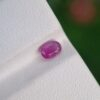 Captivating 0.60 ct oval natural sapphire, purplish pink, untreated, from Afghanistan’s rich gemstone mines.