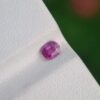 0.30 ct oval natural sapphire, purplish pink in color, unenhanced, hailing from Afghanistan.