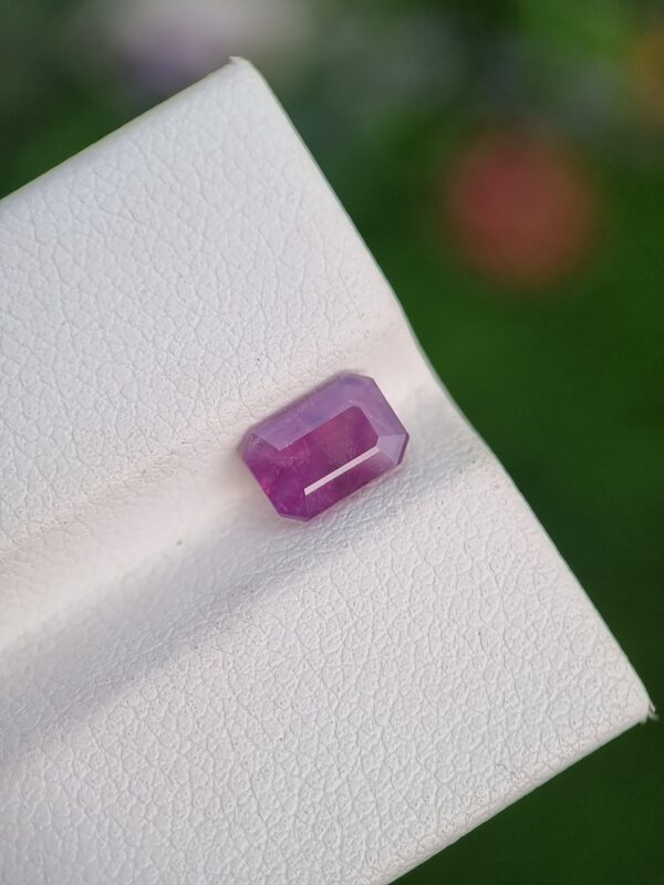 1.09 ct emerald cut natural sapphire, purplish pink, untreated, authentic Afghan origin.