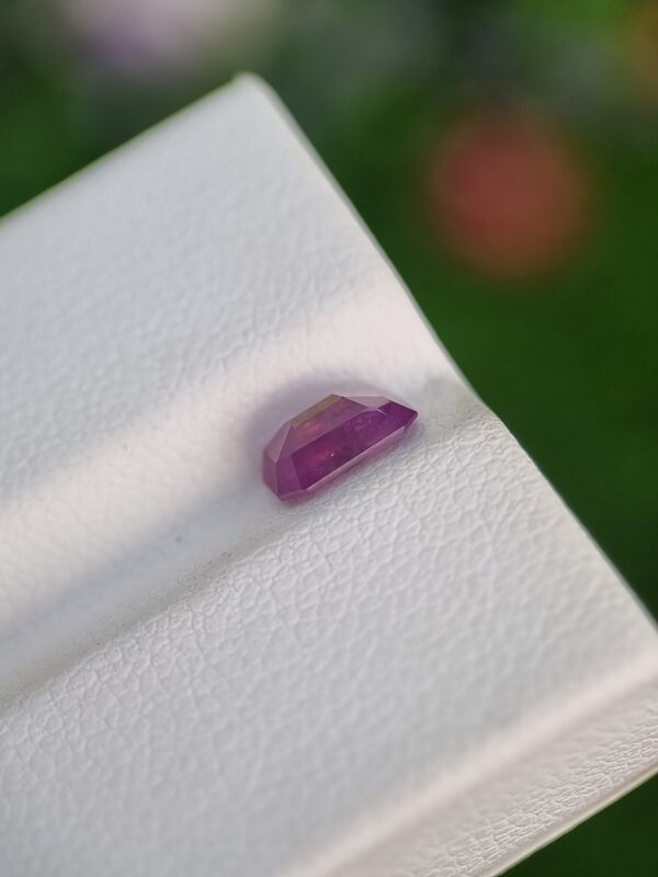 1.09 ct emerald cut natural sapphire, purplish pink, untreated, authentic Afghan origin.
