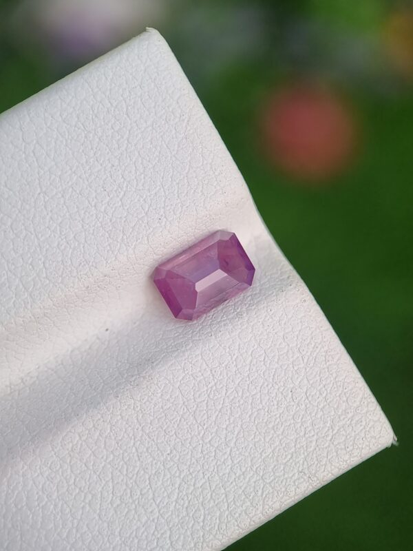 1.09 ct emerald cut natural sapphire, purplish pink, untreated, authentic Afghan origin.