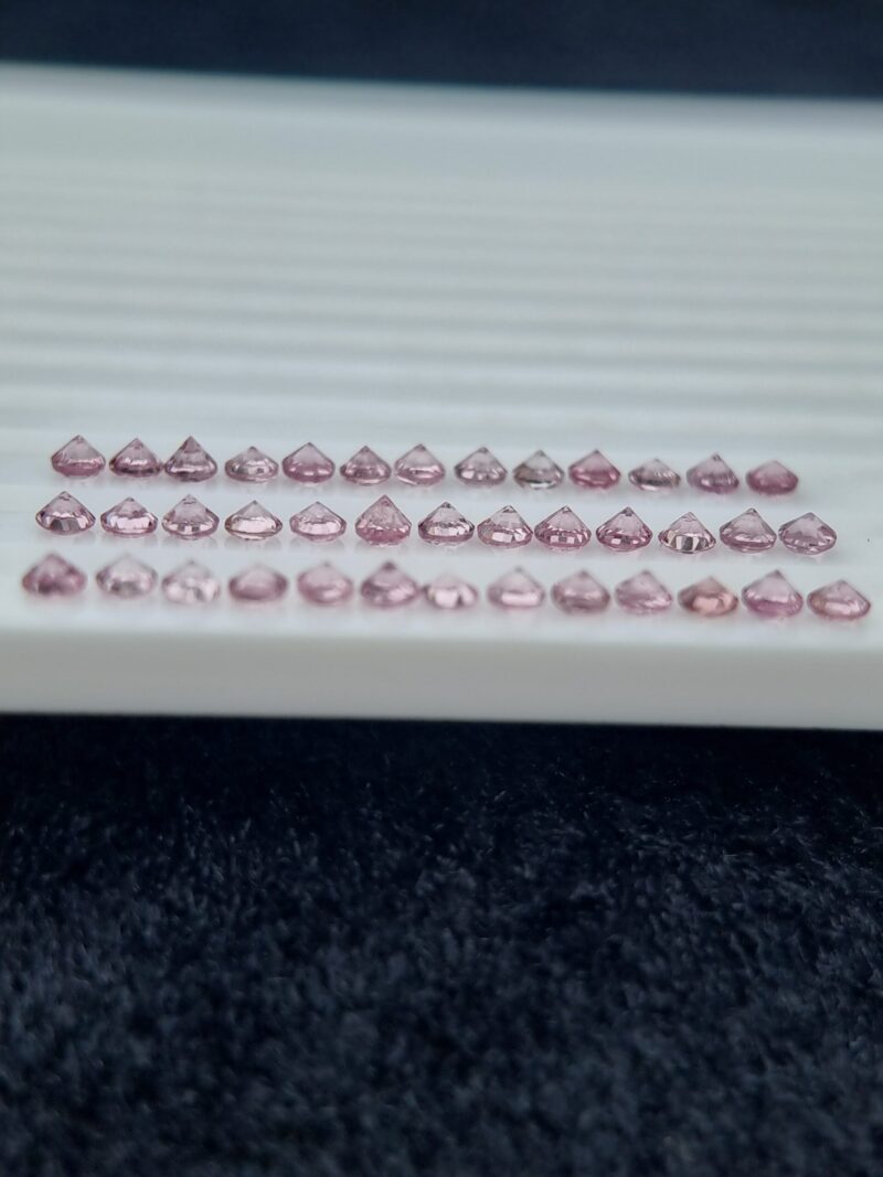 Tajikistan Pink Spinel Lot with 39 round untreated gems, totaling 5.76 carats