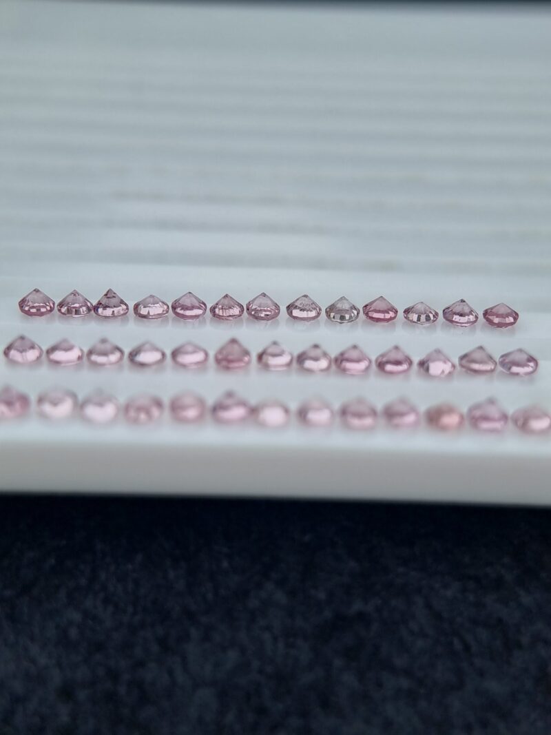 Tajikistan Pink Spinel Lot with 39 round untreated gems, totaling 5.76 carats