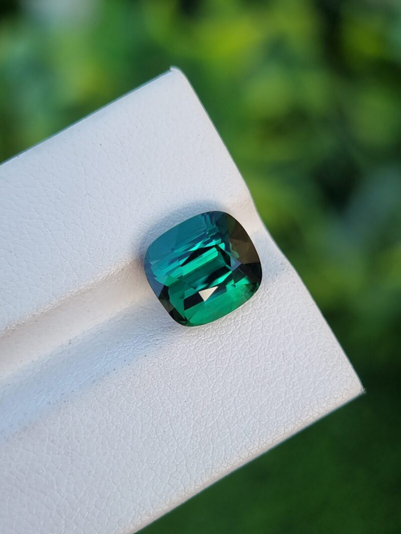 Bluish green 4.67 carat cushion-cut natural tourmaline from Congo, slightly included, untreated.
