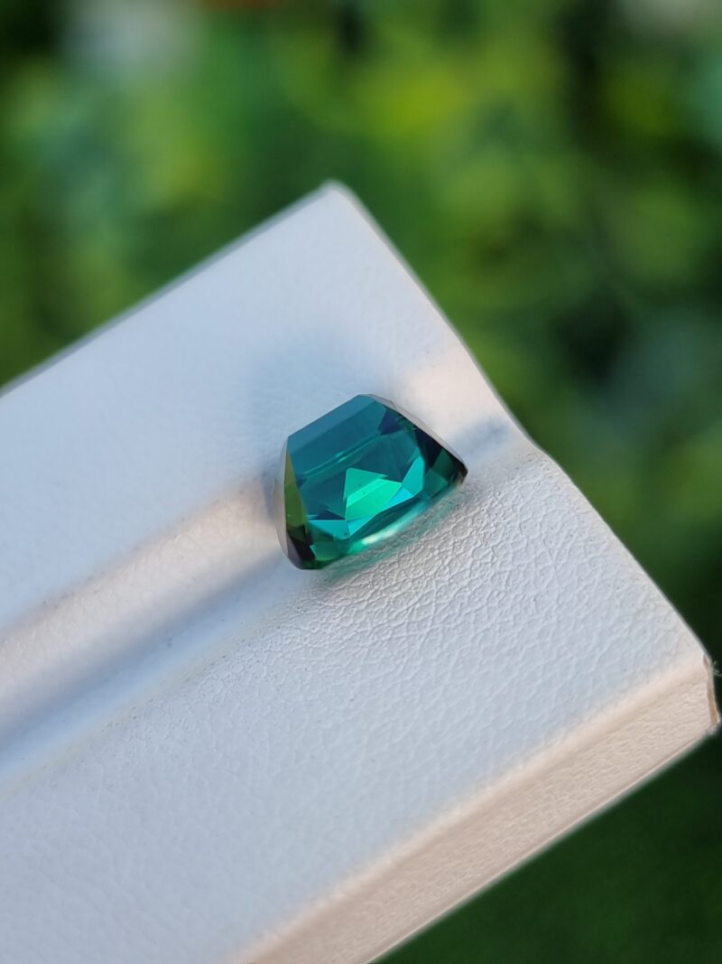 Bluish green 4.67 carat cushion-cut natural tourmaline from Congo, slightly included, untreated.