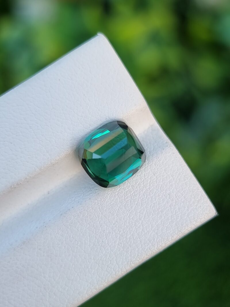Bluish green 4.67 carat cushion-cut natural tourmaline from Congo, slightly included, untreated.