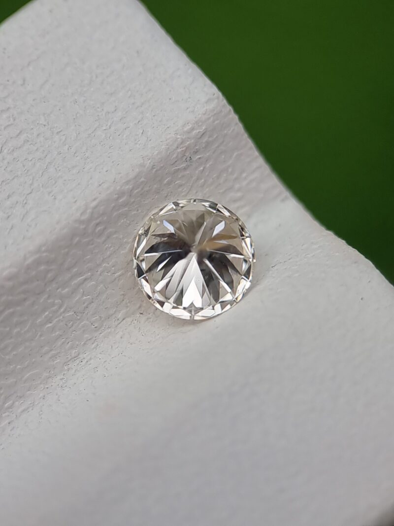 0.50 ct Round Brilliant Cut Natural Diamond - J Color, SI1 Clarity, Strong Blue Fluorescence