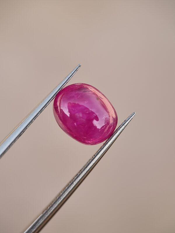 3.16-carat natural pinkish-red oval cabochon ruby from Afghanistan