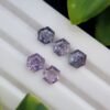 Five hexagonal natural spinel stones in varying shades of purple and violet, untreated and calibrated, from Badakhshan, Afghanistan