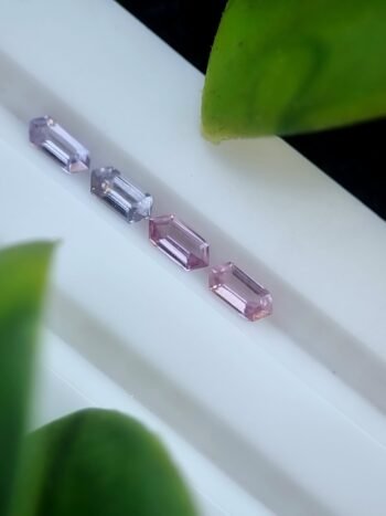 Four elongated hexagonal natural spinel stones in purplish pink and violet, unaltered and calibrated, sourced from Badakhshan, Afghanistan | Calibrated | 0.37 ct