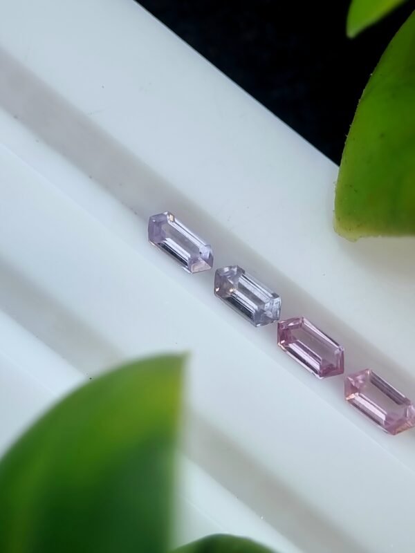 Four elongated hexagonal natural spinel stones in purplish pink and violet, unaltered and calibrated, sourced from Badakhshan, Afghanistan | Calibrated | 0.37 ct