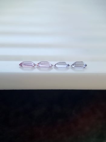 Four elongated hexagonal natural spinel stones in purplish pink and violet, unaltered and calibrated, sourced from Badakhshan, Afghanistan | Calibrated | 0.37 ct