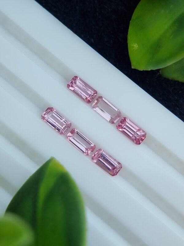 Calibrated natural pink spinel lot, emerald cut, 2.39 ct from Tajikistan, untreated and clear.