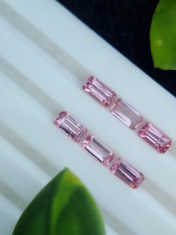 Calibrated natural pink spinel lot, emerald cut, 2.39 ct from Tajikistan, untreated and clear.
