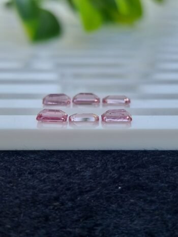 Calibrated natural pink spinel lot, emerald cut, 2.39 ct from Tajikistan, untreated and clear.