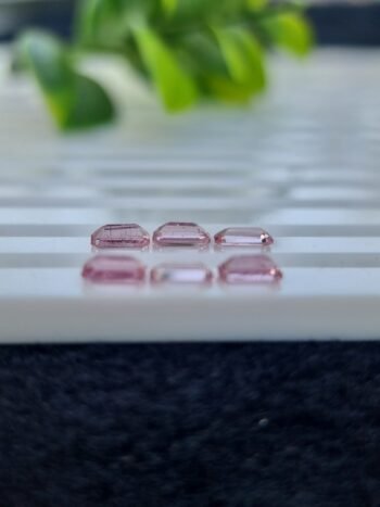 Calibrated natural pink spinel lot, emerald cut, 2.39 ct from Tajikistan, untreated and clear.