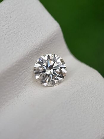 0.50 ct Round Brilliant Cut Natural Diamond - J Color, SI1 Clarity, Strong Blue Fluorescence