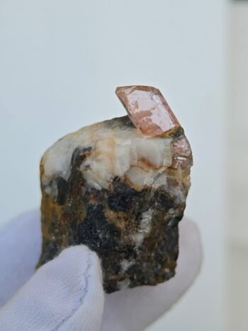 Natural Pinkish Orange Imperial Topaz specimen from Katlang Pakistan, raw uncut crystal on host rock
